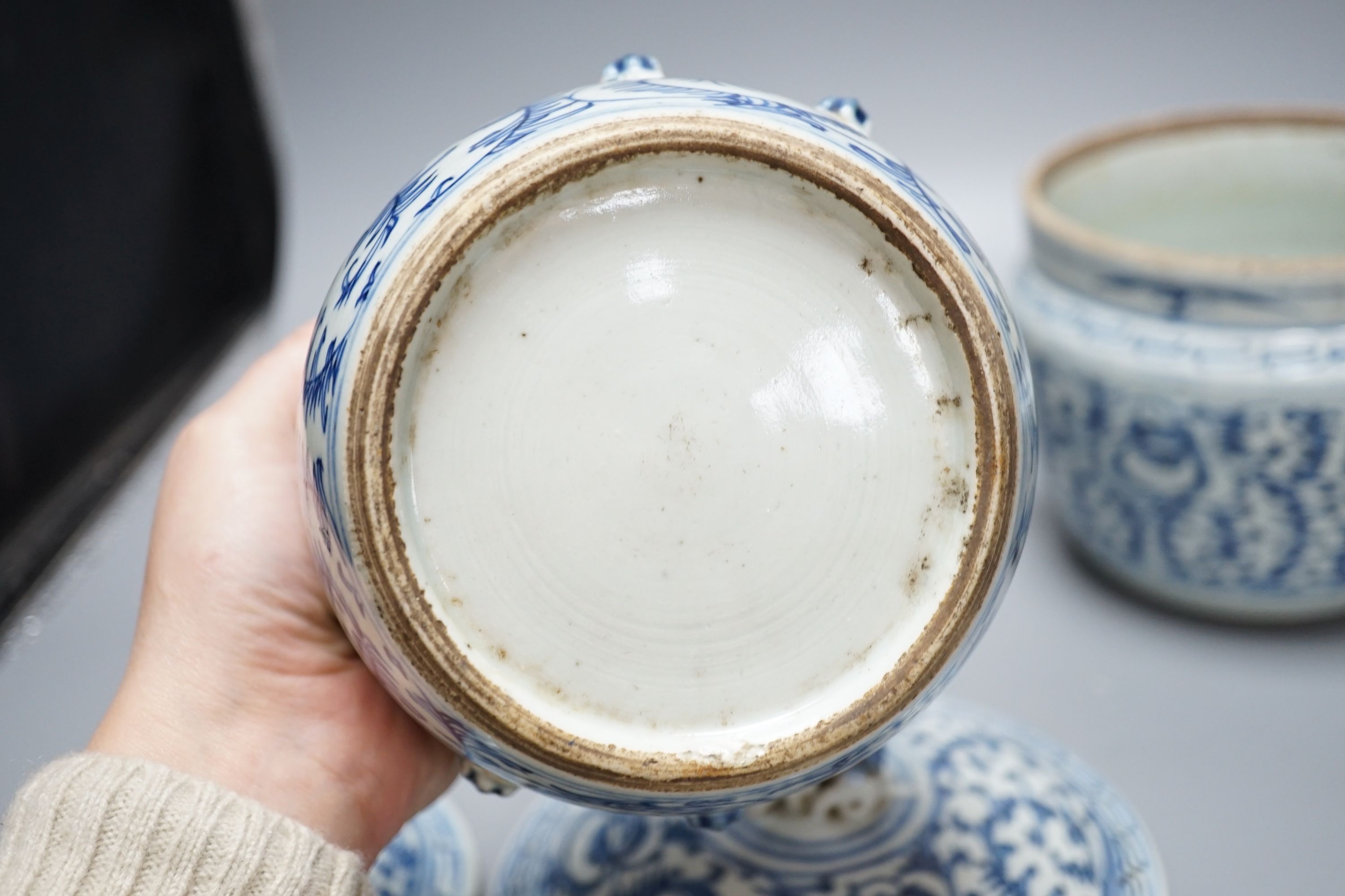 Two Chinese blue and white jars and covers - tallest 20cm high
